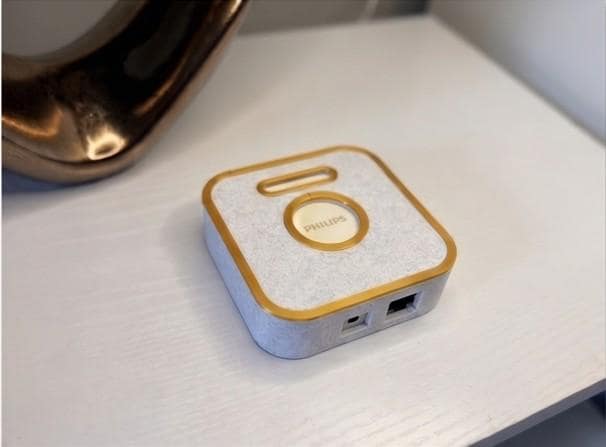 Philips Hue Bridge case rear view showing exact-fit cutouts for Ethernet, power, and button access